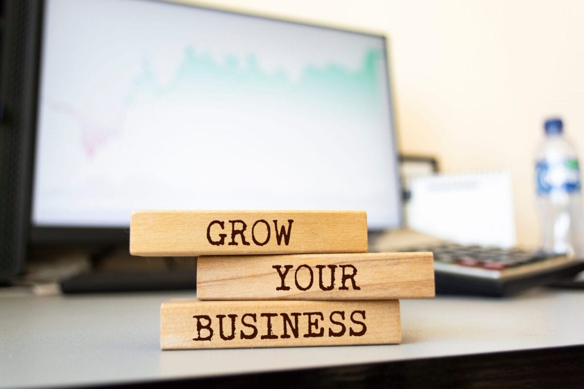 blocks on a desk spelling Grow Your Business