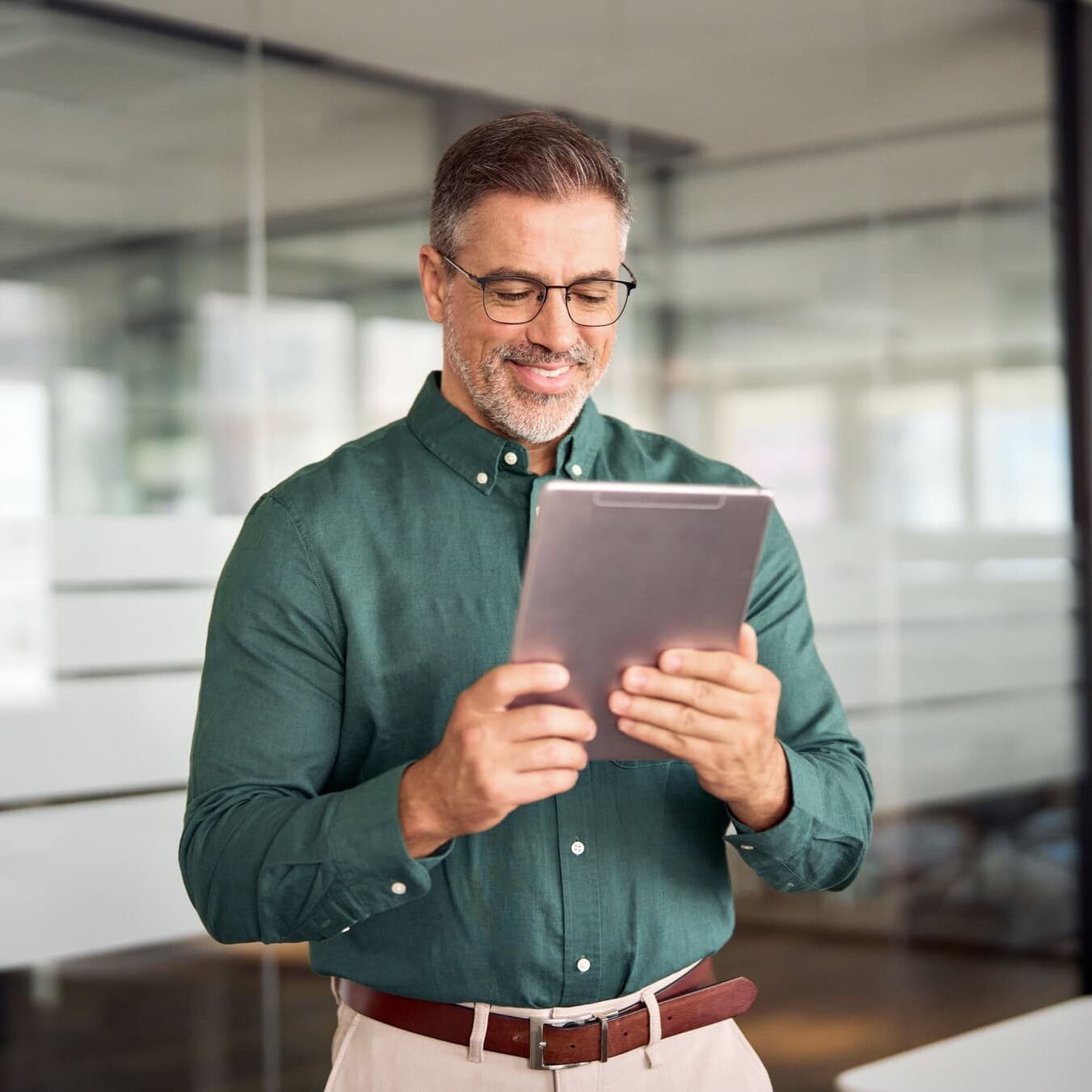 A man uses a tablet to look into the ICF Foundations, Change Markers