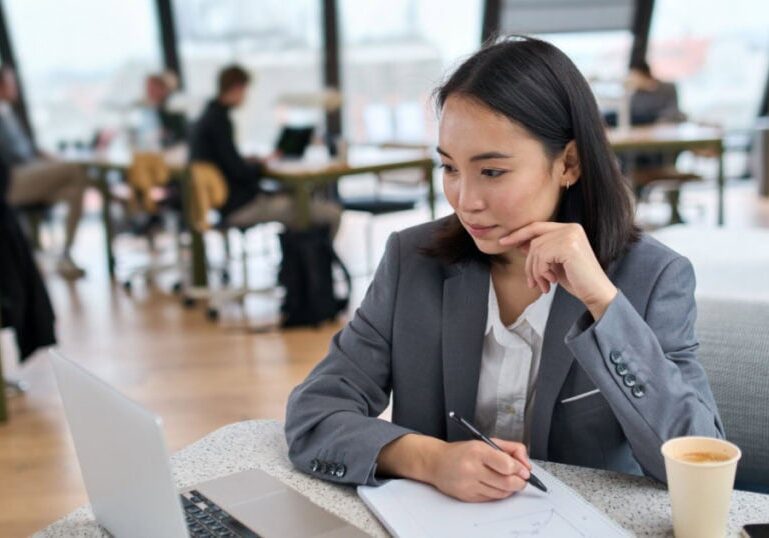 Professional setting illustrating the value of investing in coaching for organizational and individual growth.