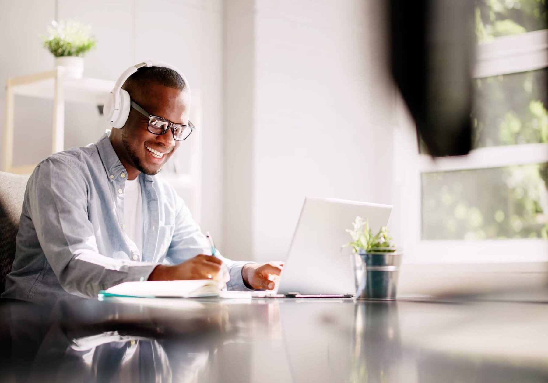 A man views the exam accommodations on his laptop