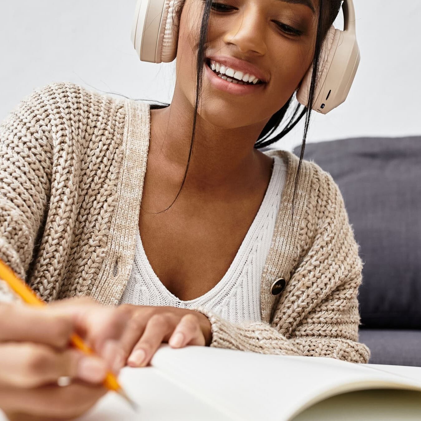 A woman reviews the literature reviews from the ICF Academic research at home