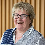 Headshot of Kath Milne, MCC with the International Coaching Federation. Known for creating opportunities that bring out the best in individuals and organizations.