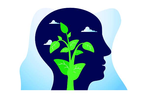 simple clipart style of head with clouds and plant growing within the head